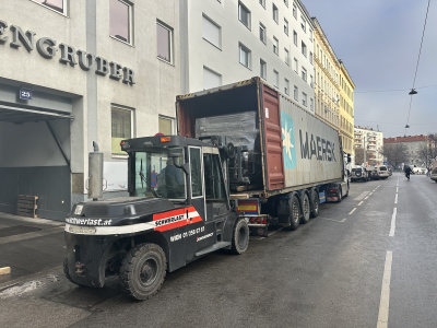 Loading of offset printing machine Heidelberg SM 102-10P+LX