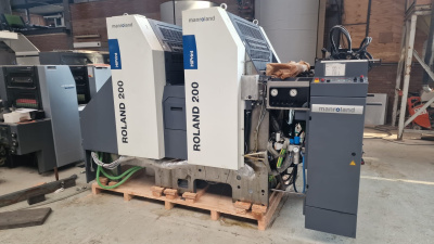 Loading 2 color offset press Roland 202 E 0B HiPrint