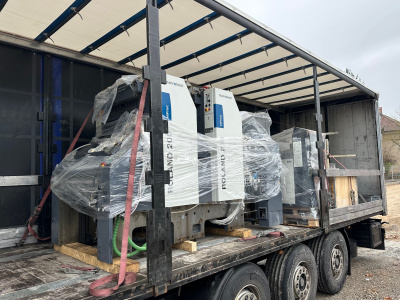 2 color offset press Man Roland 202 E HiPrint loaded on truck