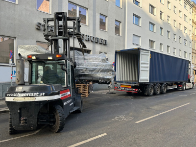 Loading of offset printing machine Heidelberg SM 102-10P+LX